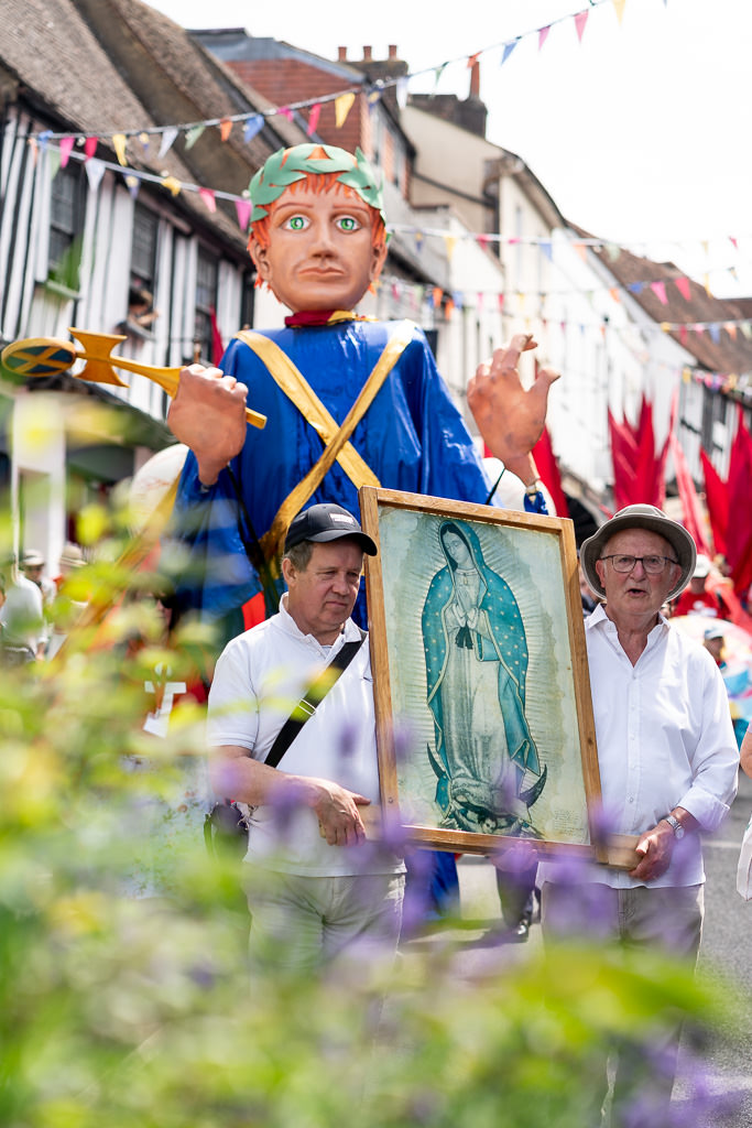 St Alban puppet being preceded by an image
